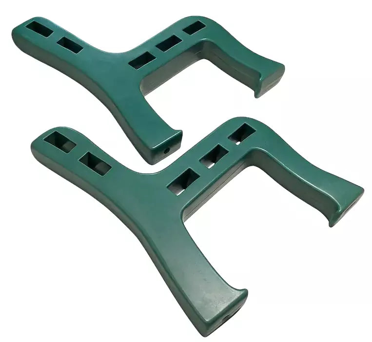Two green plastic brackets on a white background